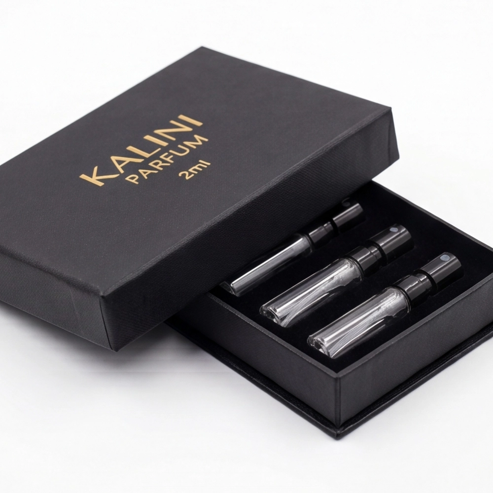 Three perfume sample vials in a compact private-label rigid presentation box
